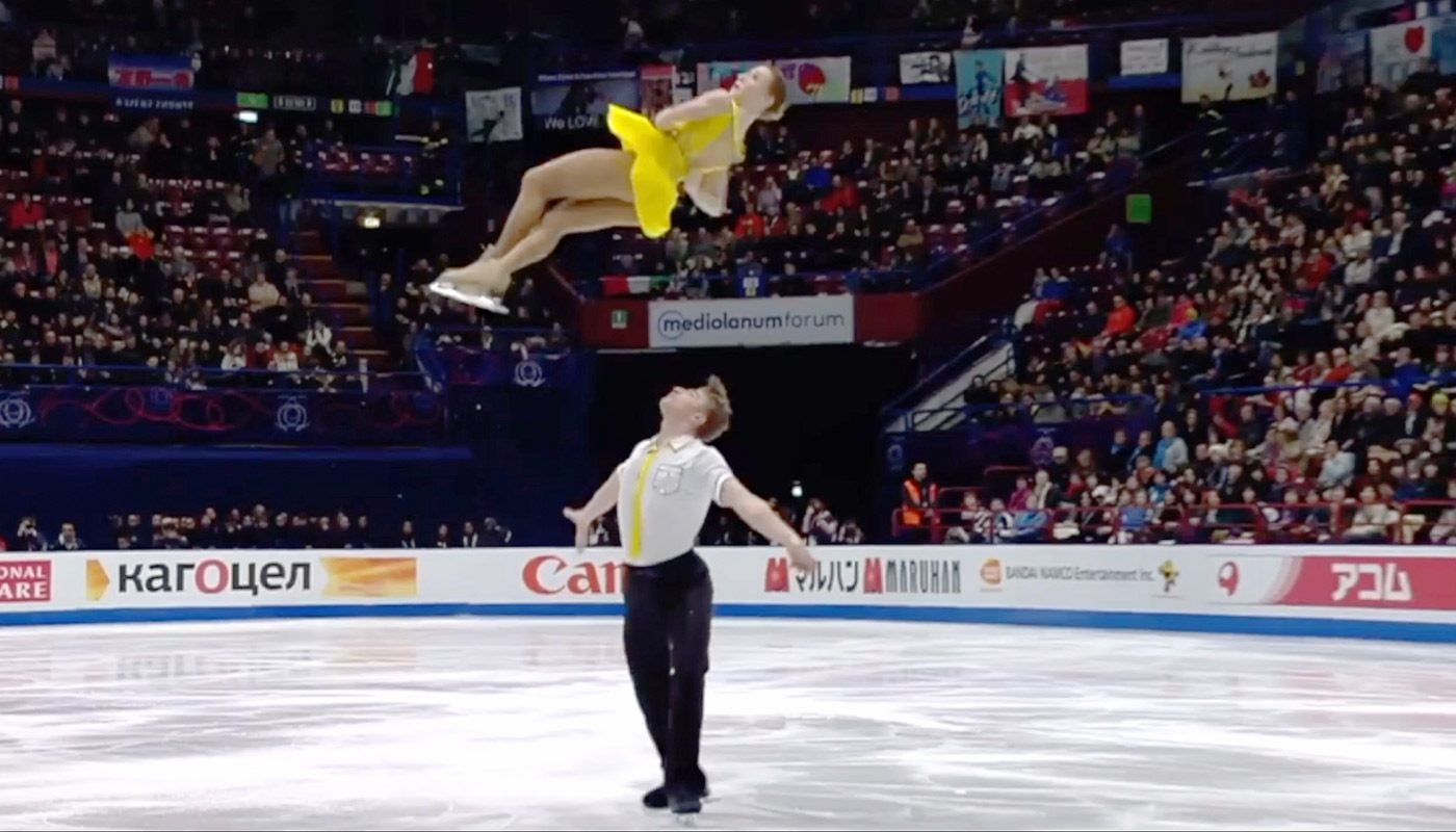 skaters pair in ice rink, skating for championship